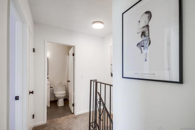 bathroom featuring tile patterned floors and toilet