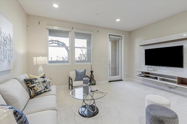 living room with light colored carpet