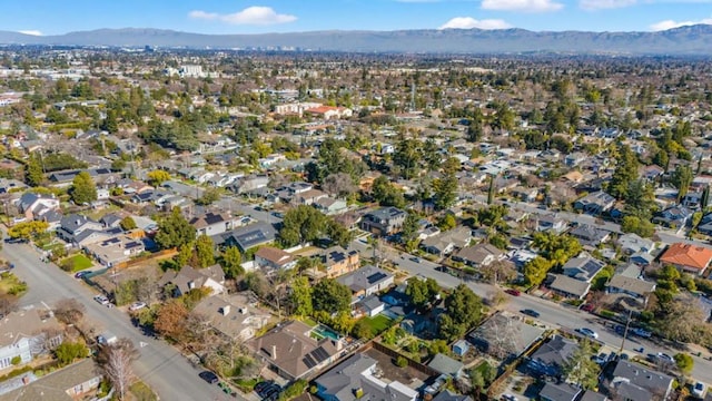 birds eye view of property featuring a mountain view