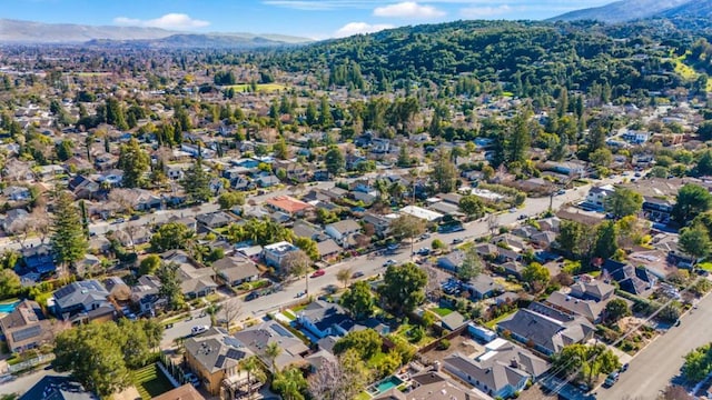 drone / aerial view featuring a mountain view