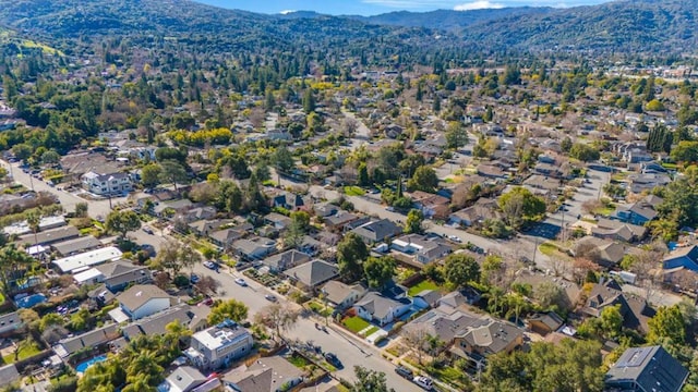 birds eye view of property featuring a mountain view