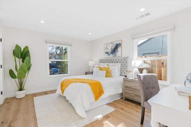 bedroom featuring light hardwood / wood-style flooring