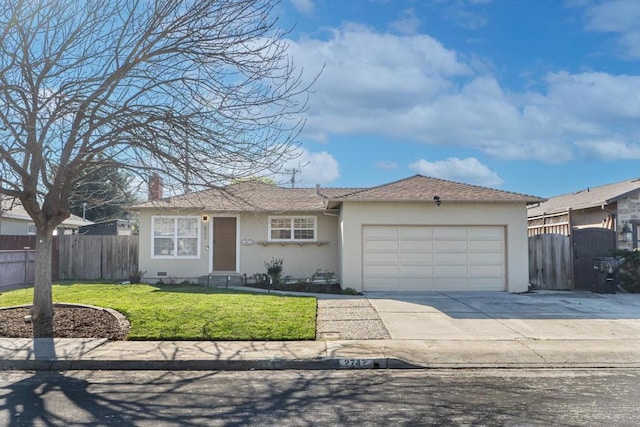 ranch-style house with a garage and a front lawn