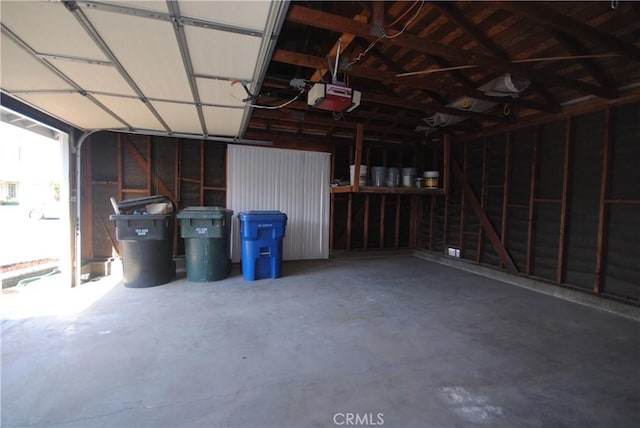 garage featuring a garage door opener