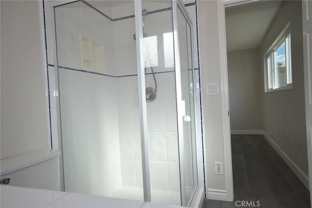 bathroom featuring walk in shower