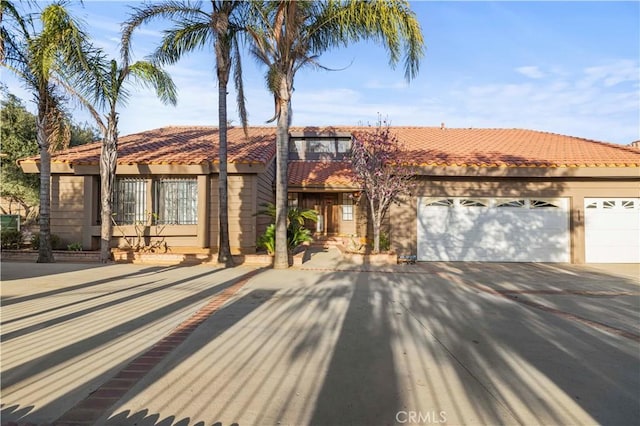 view of front of property with a garage