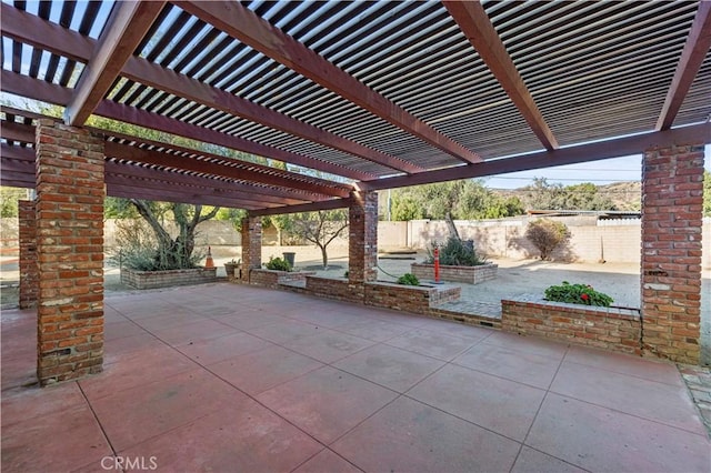 view of patio / terrace featuring a pergola