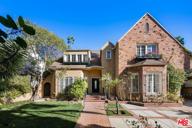 view of front property with a front lawn