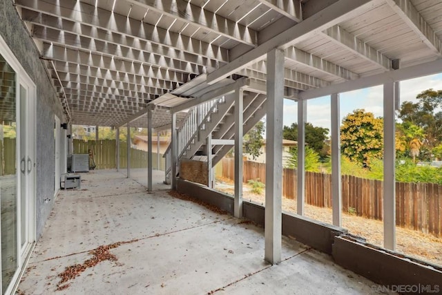 unfurnished sunroom with plenty of natural light