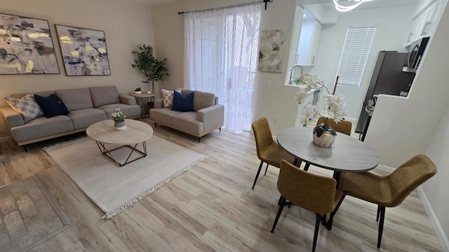 living room featuring light wood-type flooring