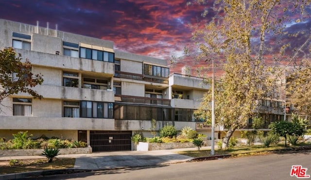 outdoor building at dusk featuring central AC