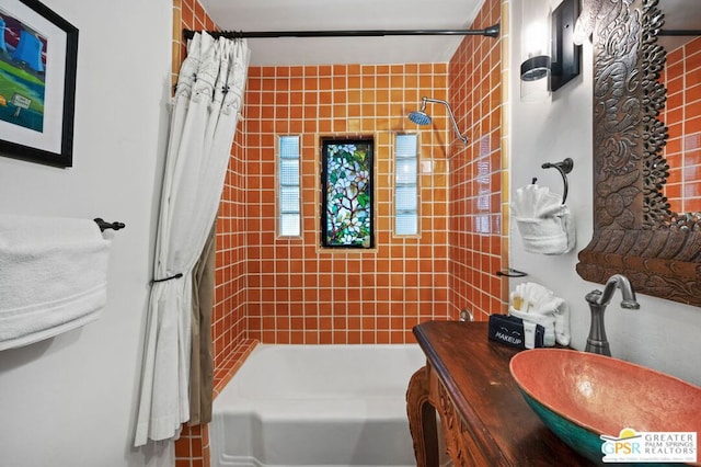 bathroom with shower / bath combo and vanity