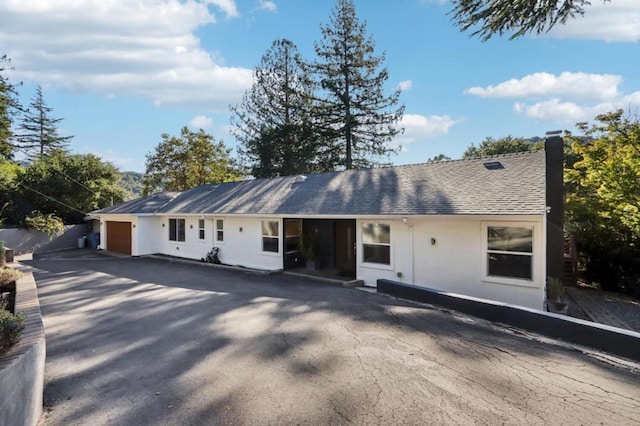 view of front of home featuring a garage