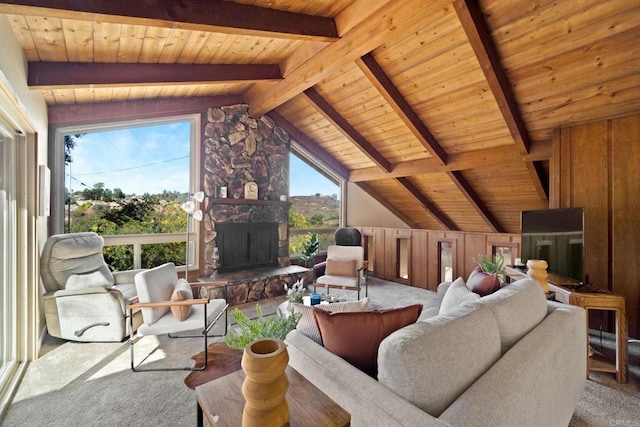 living room featuring wood walls, carpet floors, vaulted ceiling with beams, and wood ceiling