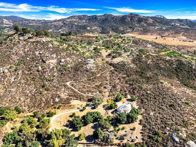 drone / aerial view featuring a mountain view