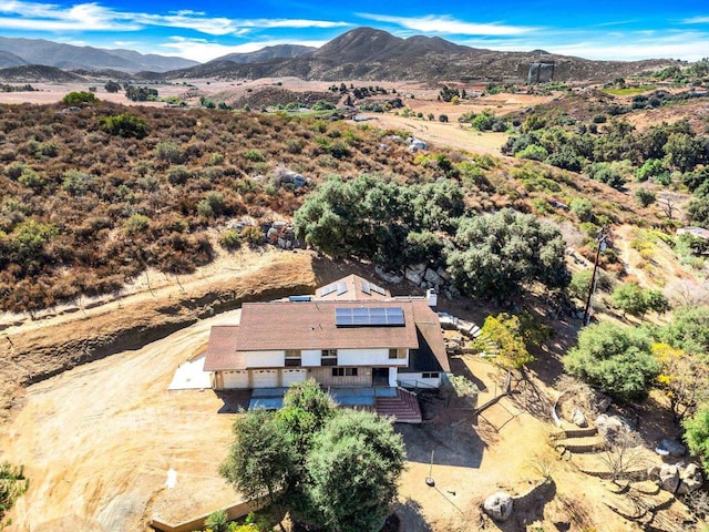 drone / aerial view featuring a mountain view