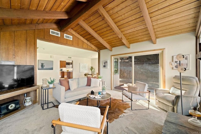 living room with light colored carpet, vaulted ceiling with beams, and wooden ceiling