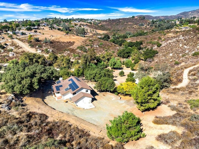 drone / aerial view featuring a mountain view