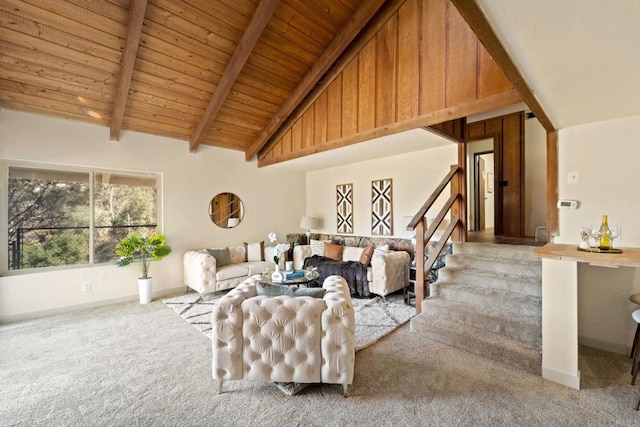 living room featuring light colored carpet, beamed ceiling, high vaulted ceiling, and wood ceiling