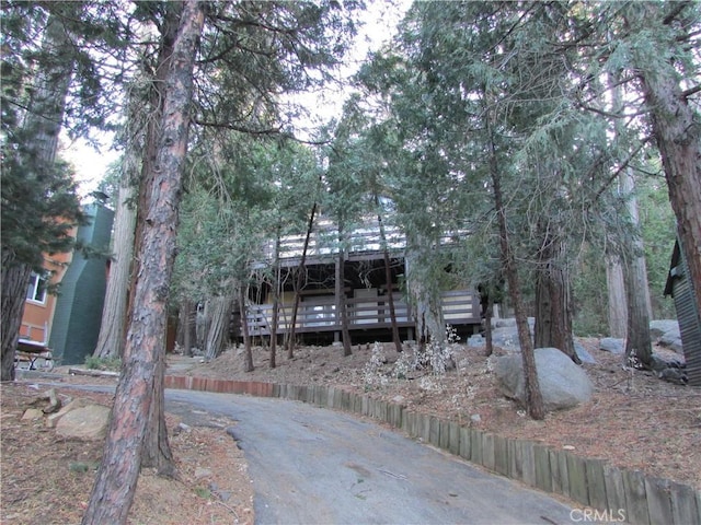 view of property hidden behind natural elements