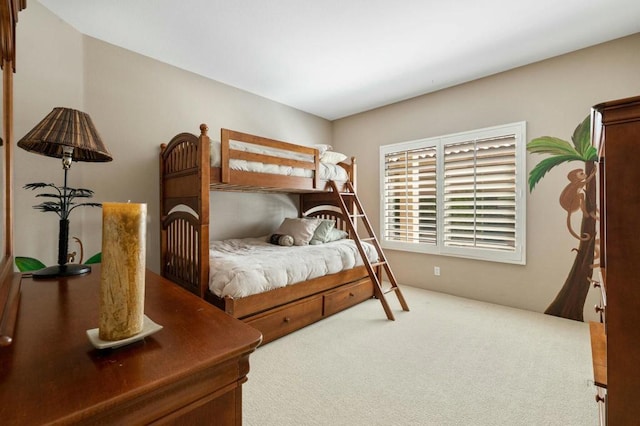 bedroom featuring carpet