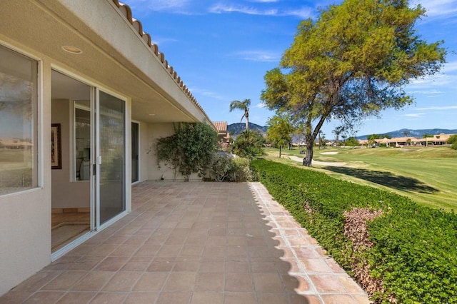 view of patio / terrace featuring a mountain view