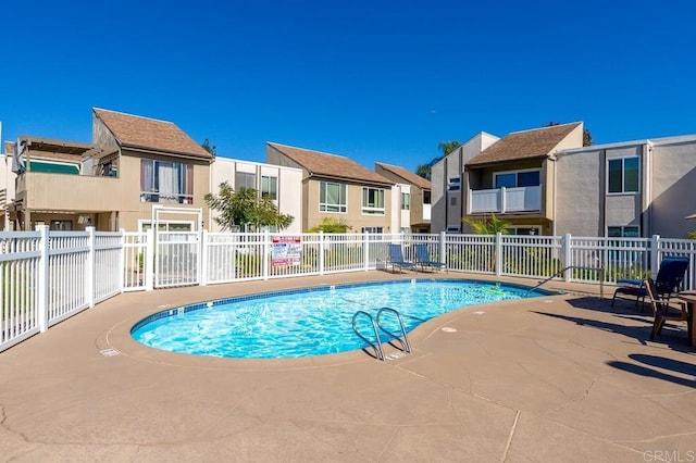 view of pool featuring a patio