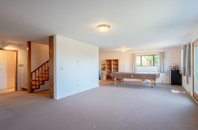 playroom with light colored carpet