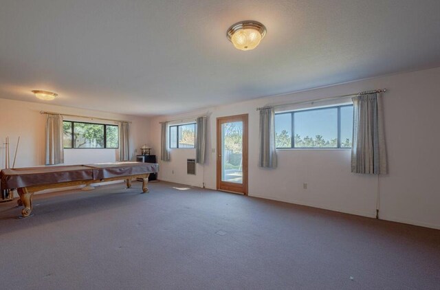 playroom with carpet floors and pool table