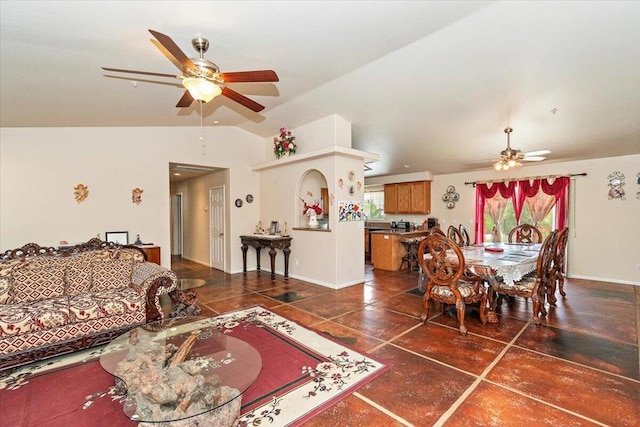 tiled living room with ceiling fan and lofted ceiling