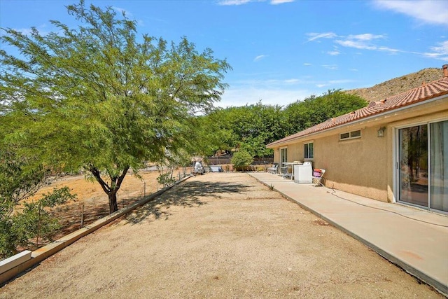 view of yard with a patio area