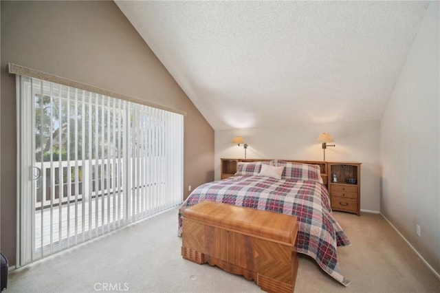 bedroom featuring access to exterior, light carpet, and lofted ceiling