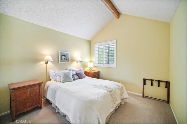 bedroom with a textured ceiling, lofted ceiling with beams, and light colored carpet