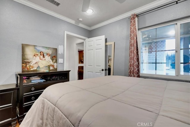 bedroom with ornamental molding