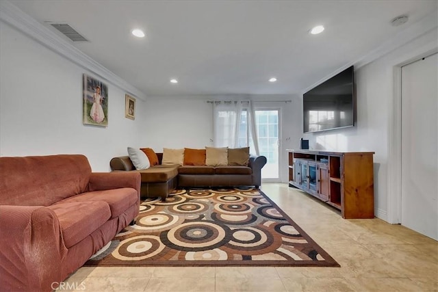 living room with ornamental molding