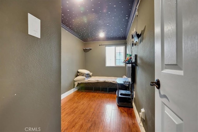 bedroom featuring wood-type flooring