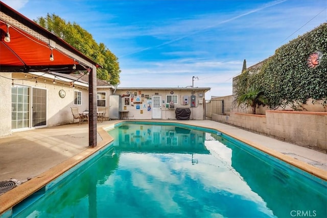 view of pool featuring a patio area