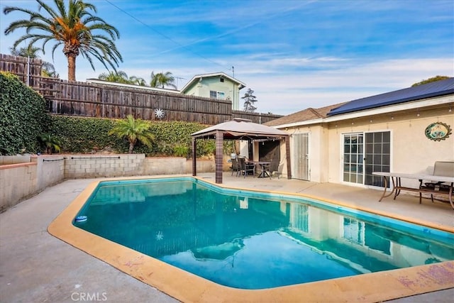 view of pool featuring a gazebo and a patio area