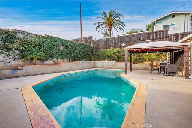 view of pool featuring a gazebo and a patio area