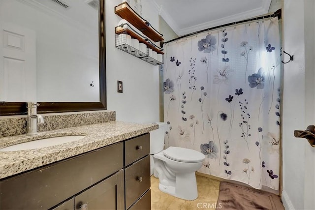 bathroom featuring vanity, ornamental molding, toilet, and walk in shower