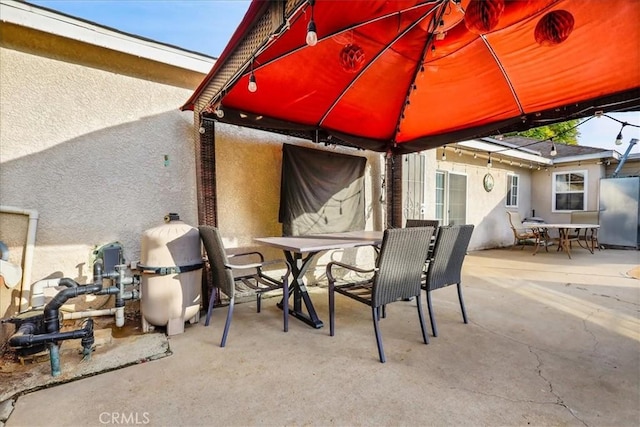 view of patio featuring a gazebo