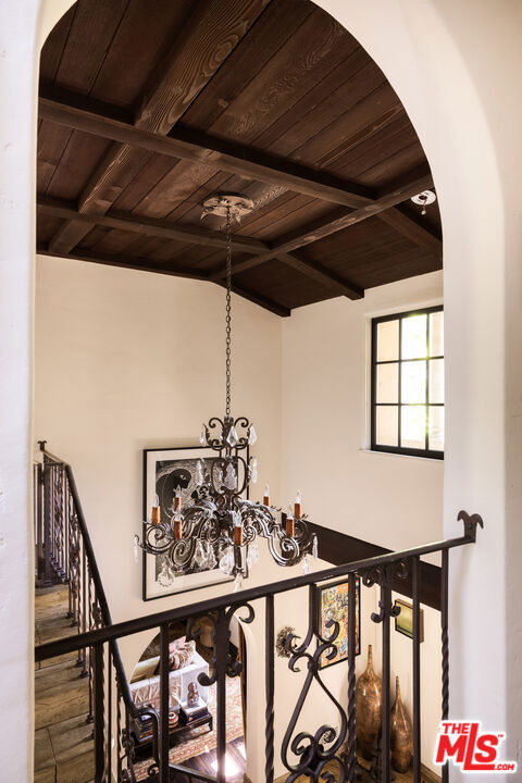 details featuring beam ceiling and wood ceiling