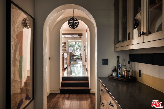 bar featuring dark hardwood / wood-style floors