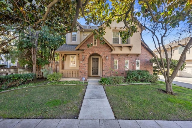 view of front of property with a front lawn