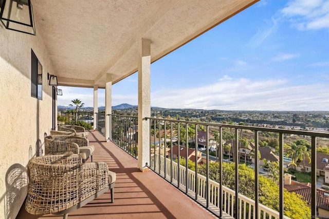 balcony featuring a mountain view