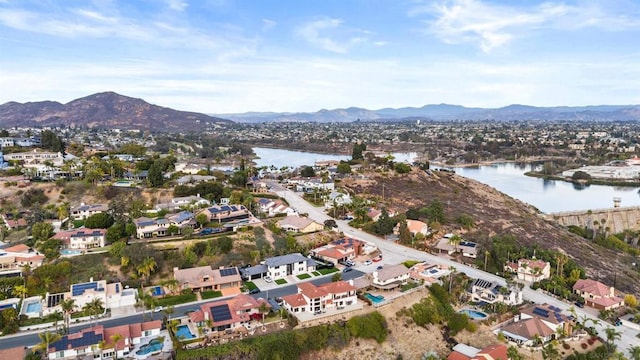 bird's eye view featuring a water and mountain view