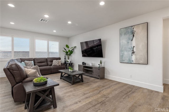 living room featuring light wood-type flooring