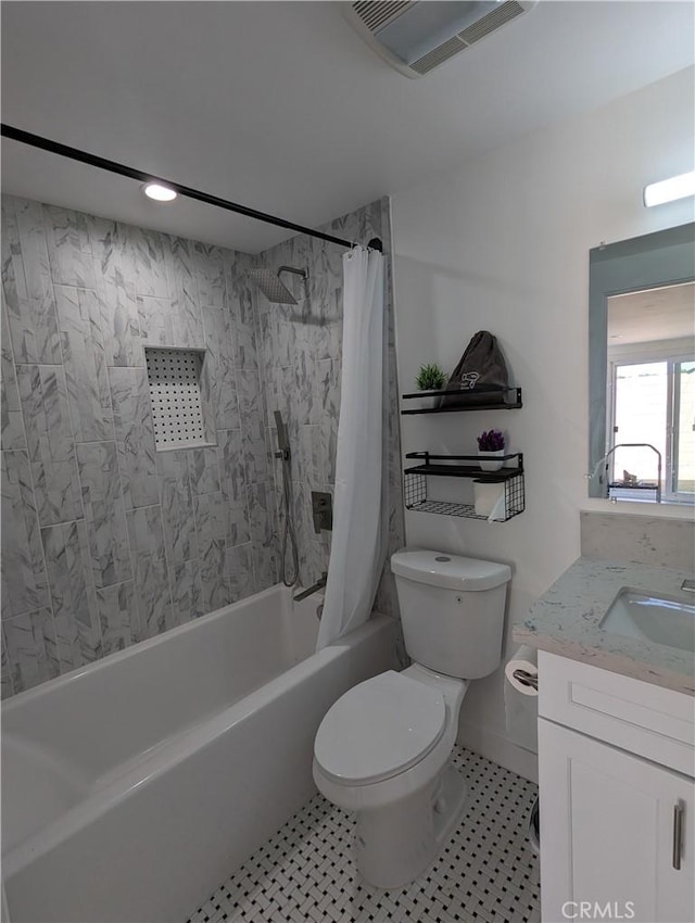 full bathroom with vanity, shower / bathtub combination with curtain, and toilet