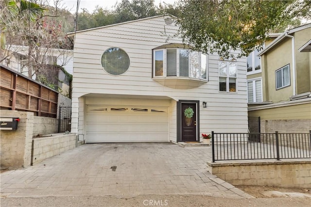 view of front of home featuring a garage