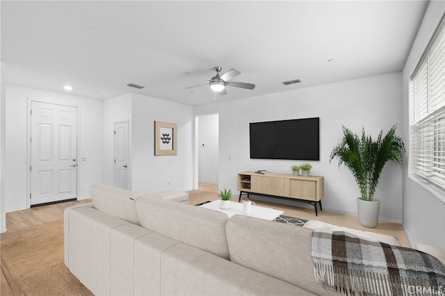 living room with ceiling fan